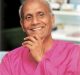 Sri-Chinmoy-smiling-purple-adarani-2