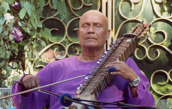 esraj-purple-sri-chinmoy-tv